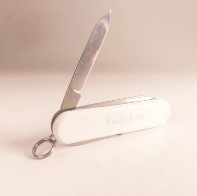 Victorinox Classic SD 58mm White  PEACHES COUTELLERIE DU MONT BLANC GENEVE - Image 1 of 4