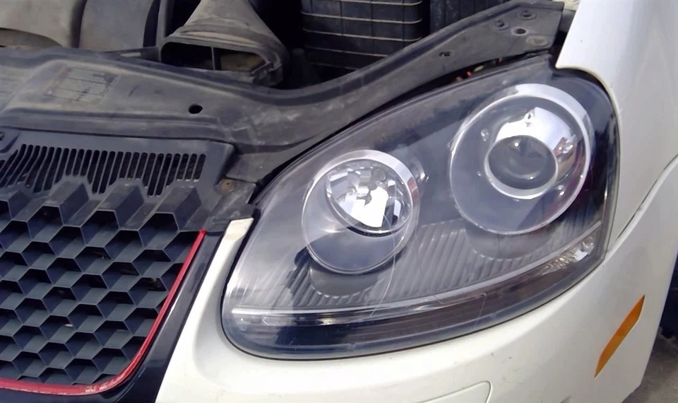 06 07 2008 09 10 Faro izquierdo conductor Volkswagen VW Jetta faro xenón HID Foto 1 de 4