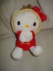 Hello Kitty wearing red Christmas out fit  year 2010 retired