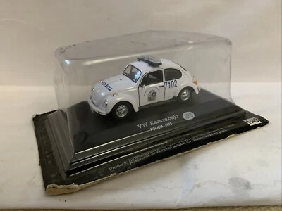 Volkswagen Beetle 1979 escala 1:43 con librea Policia, paquete blister envejecido sin abrir Foto 1 de 4