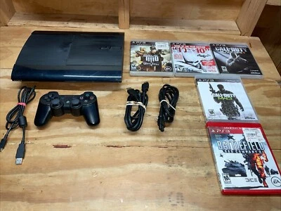 Sony PlayStation 3 Super Slim 12GB PS3 con Cables, Mando y 5 Juegos CECH-4201A Foto 1 de 4