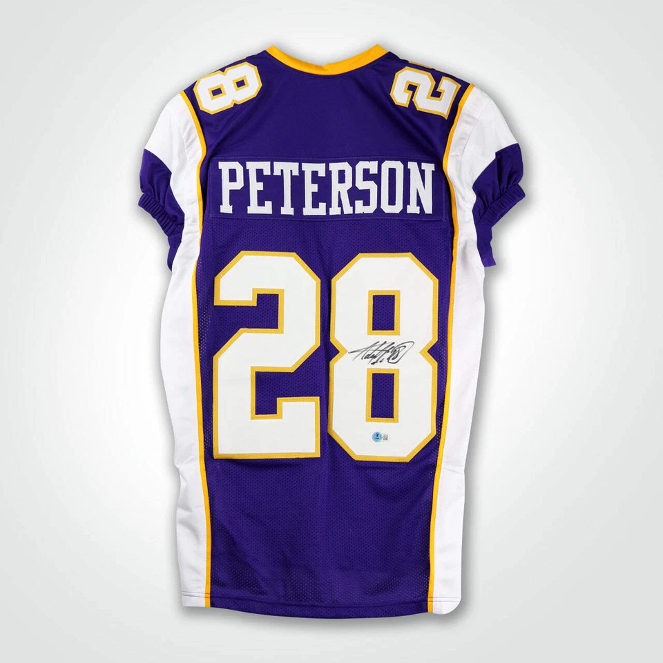 Camiseta de fútbol americano estilo profesional púrpura firmada por Adrian Peterson Foto 1 de 3