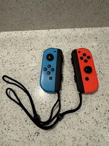 Nintendo Switch Joy-Cons Neon Red and Blue with Wrist Straps Official Genuine - Picture 1 of 6