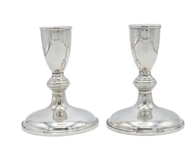 PAR DE CANDELABROS CARTIER 119 PONDERADOS ESTERLINA GUERRIDON 5"H Foto 1 de 4