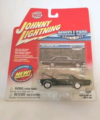 JOHNNY LIGHTNING MUSCLE CAR USA 1965 PONTIAC GTO BLACK CLEAN CARD RED LINE TIRES - Image 1 of 3