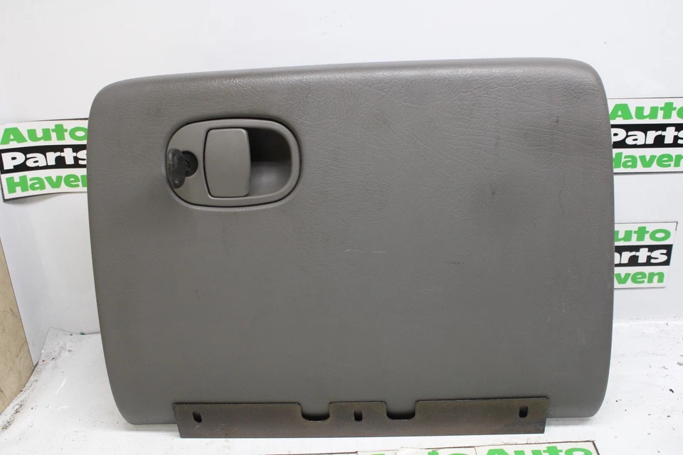 02-05 Trailblazer Envoy - Guantera gris pestillo de puerta y manija desbloqueada con llave OEM Foto 1 de 4