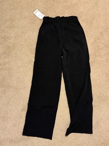 ATHLETA Rise Pant Pantalon Arrival Women’s Medium Color Black NWT - Picture 1 of 4