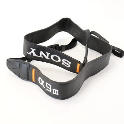 NUEVO Sony Alpha A9 III Genuino Cámara Sin Espejo Correa para el Cuello Negro y Naranja Foto 1 de 3