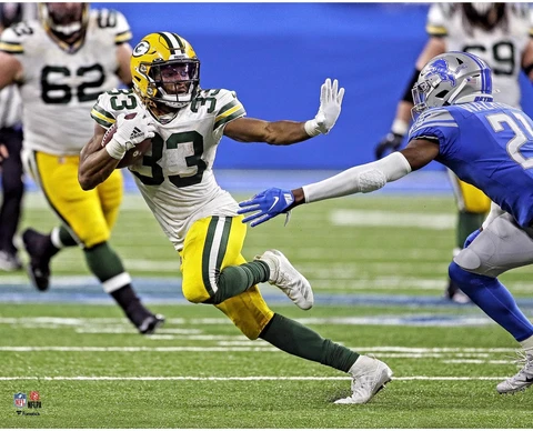 Aaron Jones Green Bay Packers Unsigned Stiff-Arm 16" x 20" Photo - Fanatics Cover