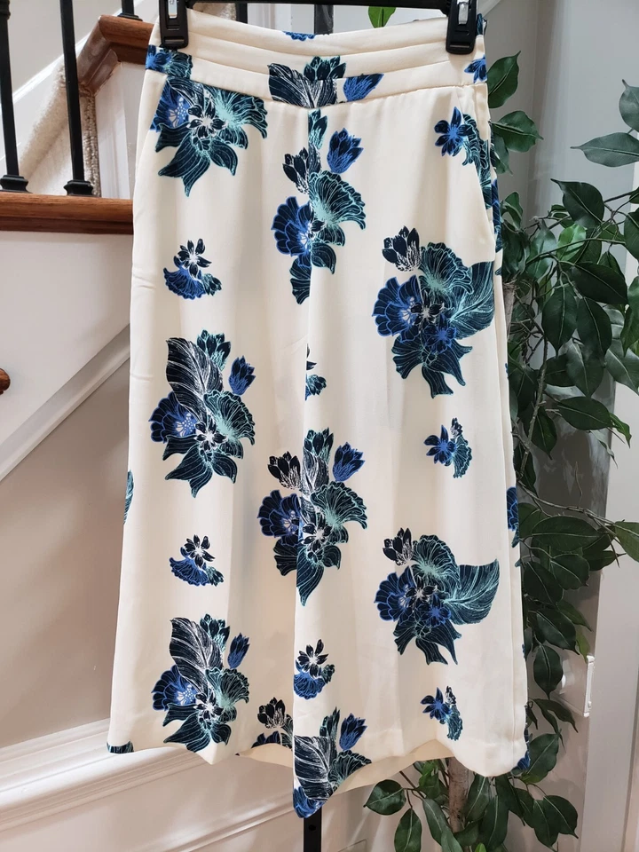 Pantalón capri H&M blanco floral poliéster recortado tiro alto culottes pierna ancha 2 Foto 1 de 4