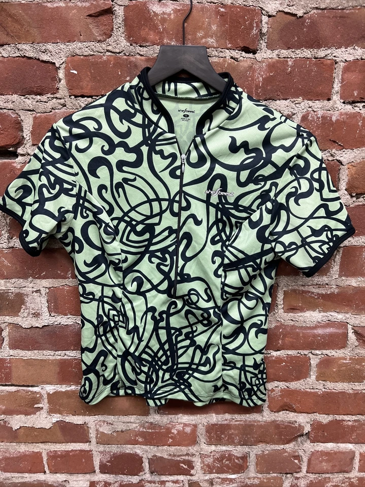 Jersey de ciclismo Shebeest para mujer pequeño cremallera completa verde negro manga corta bolsillos Foto 1 de 3