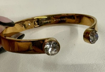 KATE SPADE NEW YORK HINGED CUFF BRACELET GOLD TONE-BRASSY CLEAR RHINESTONE 6.75 - Image 1 of 4