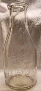 Botella de leche vintage de The Davis Company Newark Ohio cuarto de galón en relieve - Imagen 1 de 7