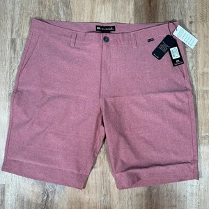 NUOVO Travis Mathew Sand Harbor 9" pantaloncini da golf uomo 40 erica granato rosa $89 - Foto 1 di 6