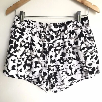 Pantalones Cortos Para Mujer Calvin Klein, Negro, Blanco y Gris Gris Bolsillos con Cremallera Talla Pequeña Foto 1 de 4