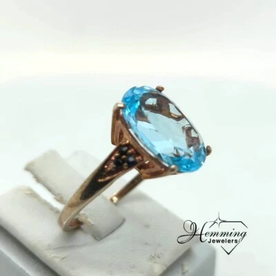 Oval Cut Blue Stone Plated Silver Ring with 6 Sapphire Accents - Image 1 of 4