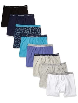 Paquete de ocho calzoncillos boxer básicos de ropa interior para niños Calvin Klein talla 8-10 M Foto 1 de 3