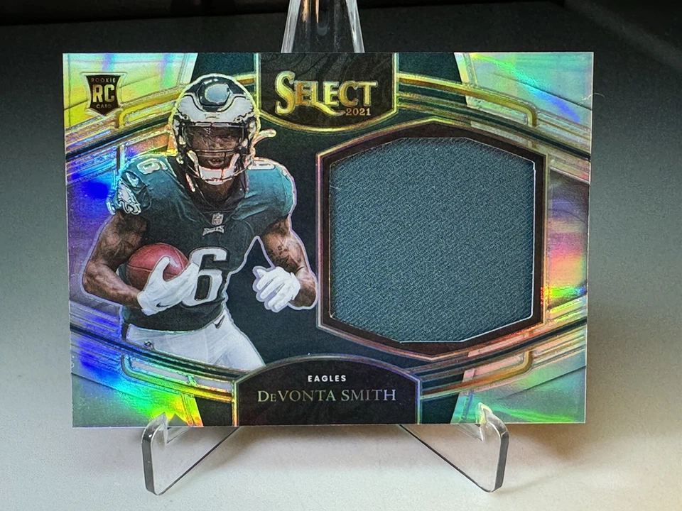 2021 Panini Select Jumbo Rookie Swatches Rookie Card Devonta Smith #JS-DSM 61/99 - Image 1 of 4