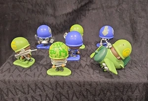 MGA Awesome Little Green Men Actionfiguren - 7 Stück Camouflage/Grün/Blau Bataillon - Bild 1 von 11