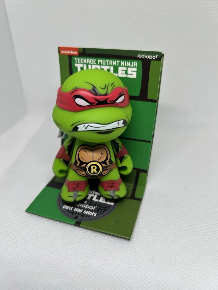 Figura Vinilo Kidrobot TMNT Serie 2 Teenage Mutant Ninja Turtles Raphael 3" Foto 1 de 4