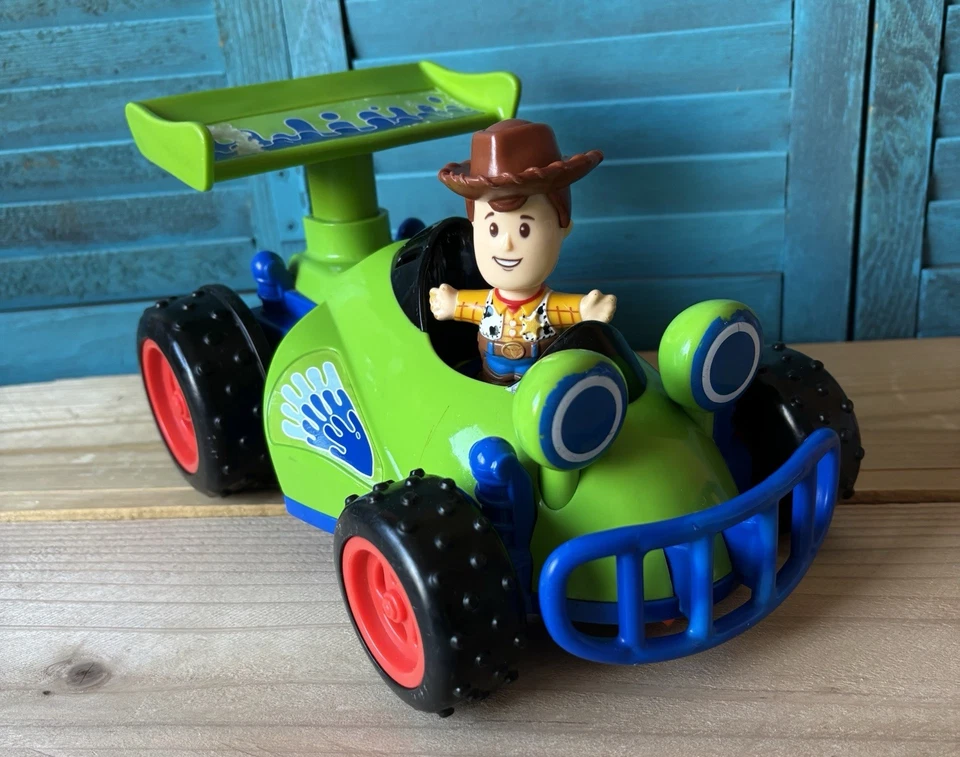 FISHER PRICE LITTLE PEOPLE TOY STORY WOODY /  RC RACE CAR  with WOODY - Image 1 of 4