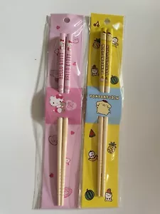 2 Stück Pompompurin und Hello Kitty Kinder Essstäbchen Bambus 21 cm Neu - Bild 1 von 8