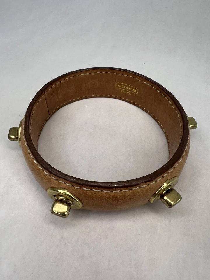Auténtica pulsera de cuero Coach Turnlock Foto 1 de 4