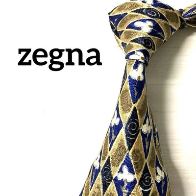 Corbata de seda Ermenegildo Zegna floral arte cuadros dorado azul usada Foto 1 de 4