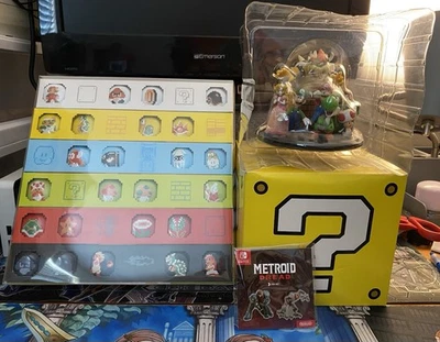 Figura Club Nintendo Mario 2010/Juego de pines Mario 2011/Juego de pines Metroid Dread Foto 1 de 4