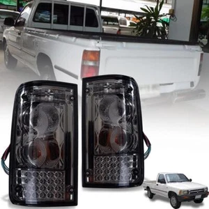 TOYOTA HILUX LN85 LN106 PICKUP PICKUP LUZ TRASERA LED LUZ DE RETROCESO LUZ DE HUMO 1989-1997 - Imagen 1 de 7