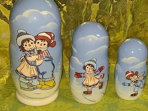 RAGGEDY ANN and ANDY 6.5" NESTING DOLL GOLDEN COCKEREL SIMON & SCHUSTER Set 7 - Picture 1 of 8