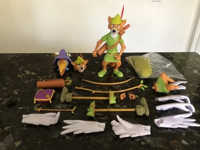 "Figura de 4"" Super7 Disney Ultimates Robin Hood con disfraz de grúa 2023 Super 7" Foto 1 de 4