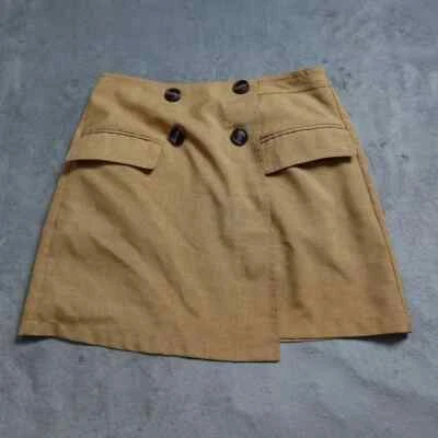 Minifalda Essue para mujer tostada mediana abotonada envoltura bolsillos traseros ¡informal! Foto 1 de 4