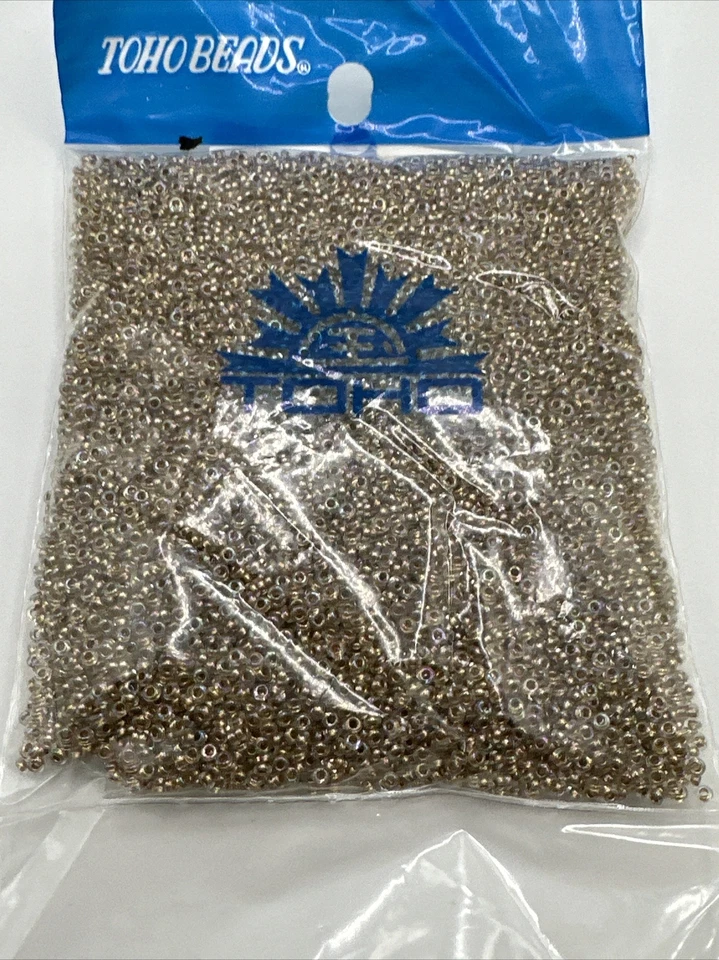 Cuentas de semillas TOHO DEMI 11/0 - Cristal arco iris forrado en oro TN-11-994 100 g (,1 kilos) Foto 1 de 3