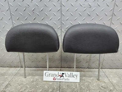 Pontiac GTO 2004-2006 reposacabezas par trasero negro usado OEM bonito para la edad Foto 1 de 4