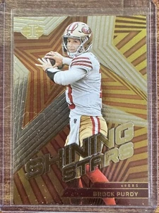 2023 Panini Illusions - Shining Stars Brock Purdy #2 49ers - Foto 1 di 2