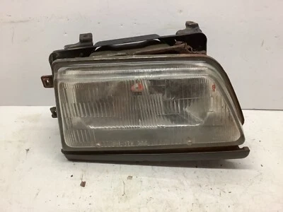 Faro derecho pasajero Honda Civic Wagon 1986-1987 OEM 001-4264 con soporte moldura Foto 1 de 4