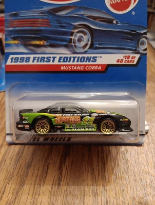 Ford Mustang Cobra 1998 primeras ediciones Hot Wheels negro #665 falta error tampo Foto 1 de 4