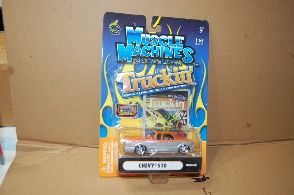 Máquinas Musculares - Chevy S10 - 1/64 - Truckin’ - TM03-02 Slam Plata Naranja Foto 1 de 1