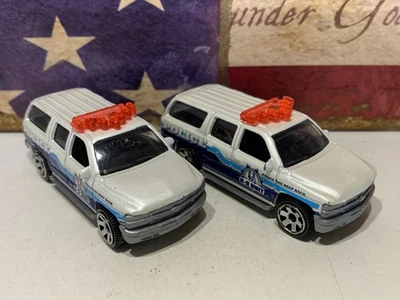 MATCHBOX 2000 CHEVY SUBURBAN X2. WHITE POLICE K-9 UNIT LOOSE - Image 1 of 4