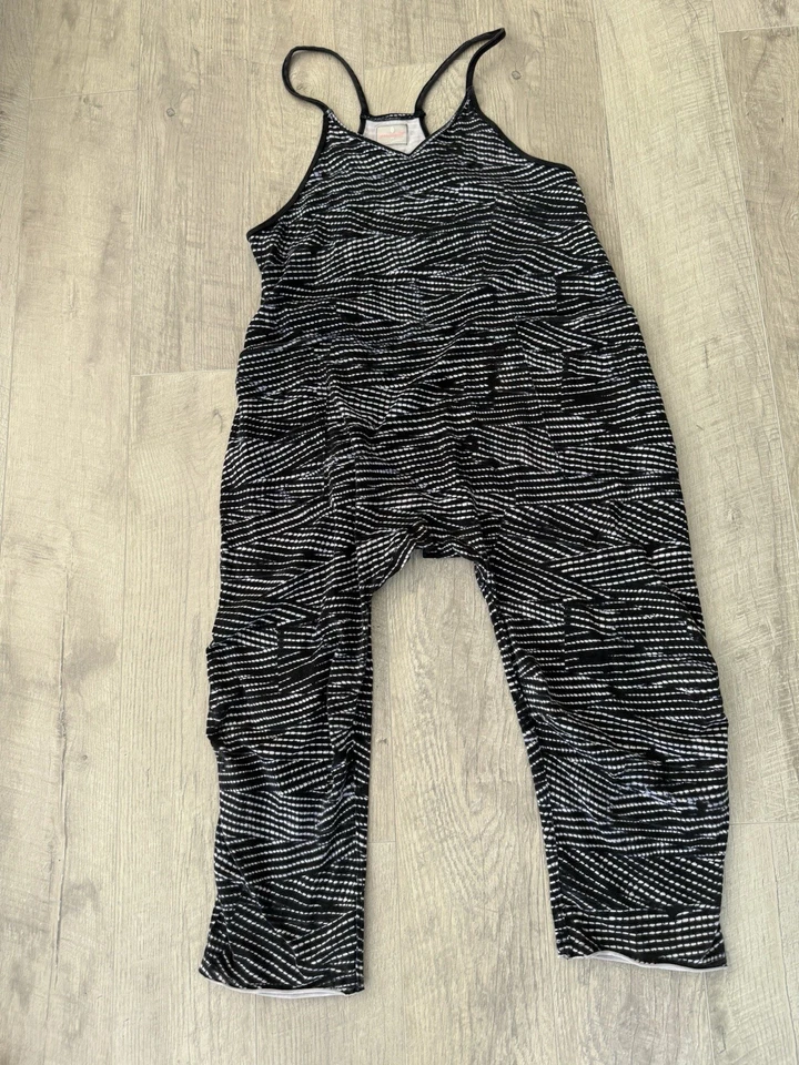 Mameluco Free People Movement Hot Shot talla XS negro blanco a rayas Foto 1 de 4