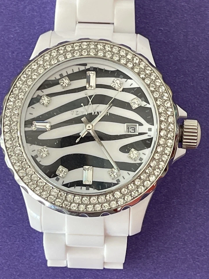 Reloj de juguete gráfico esfera cebra plástico cuarzo reloj para damas con cristales, usado Foto 1 de 4