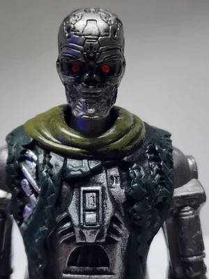 Figura de acción Playmates Terminator Salvation T-600 2009 ojos LED rojos brillantes Foto 1 de 4