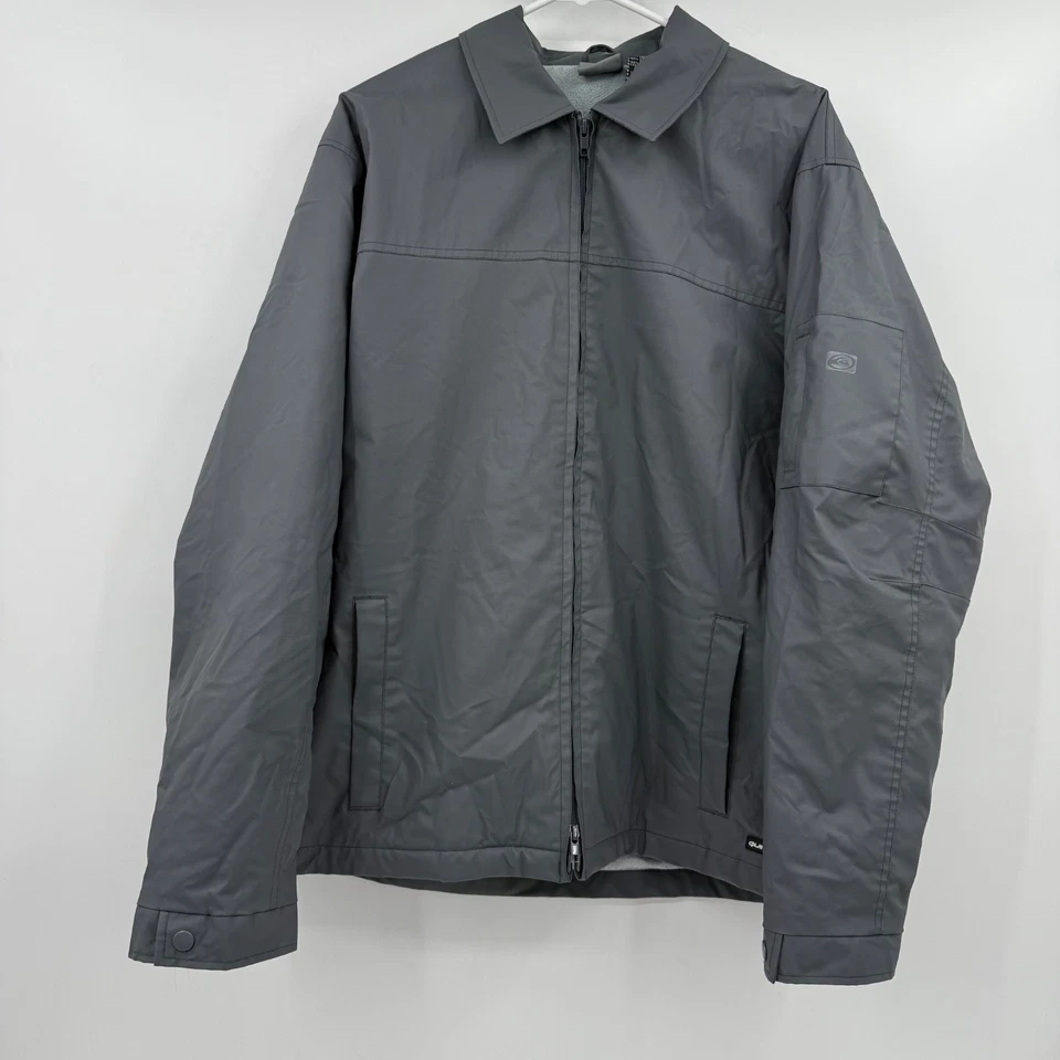 Chaqueta Quiksilver Hombre Grande Gris Forrada con Vellón Cremallera Completa PVC Carcasa Exterior Años 90 Foto 1 de 4