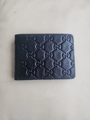 Cartera Gucci para hombre negra plegable doble Guccissima GG Foto 1 de 4