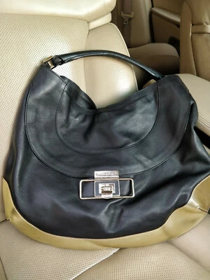 Bolso de hombro Hobo grande de cuero negro dorado Anya Hindmarch Cooper Foto 1 de 4