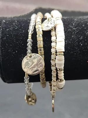 Juego de brazalete elástico brazado tono blanco y dorado 1202-04 Foto 1 de 4