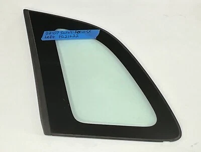 Cuarto de cristal trasero lado del conductor SUZUKI AERIO SX 2002-2007 USADO Foto 1 de 3