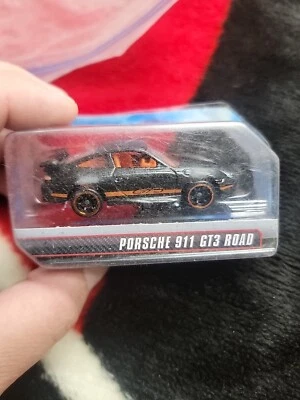 Máquinas de velocidad Hot Wheels Porsche 911 GT3 carretera negro/naranja Foto 1 de 4