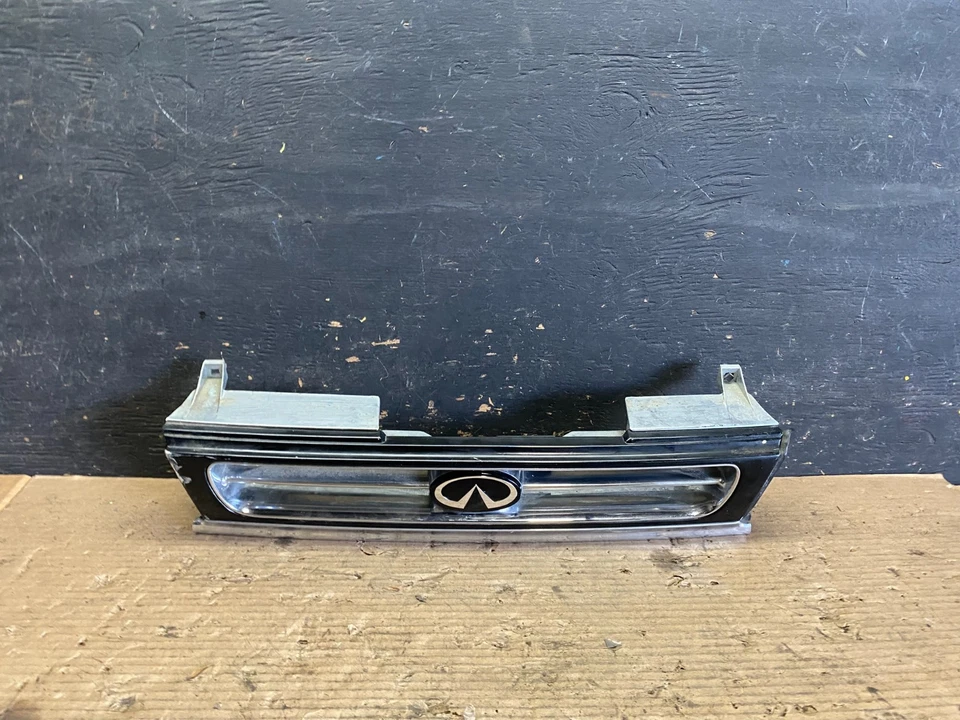 Оригинальная передняя верхняя решетка радиатора для Infiniti M30 1990–1992 годов выпуска S5859 DG - Изображение 1 из 4